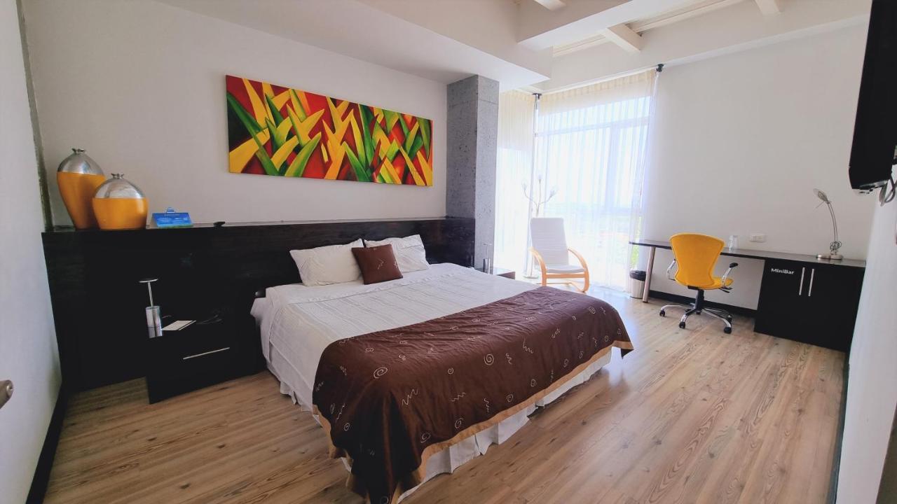 Habitat Suites Hotel Перейра Экстерьер фото