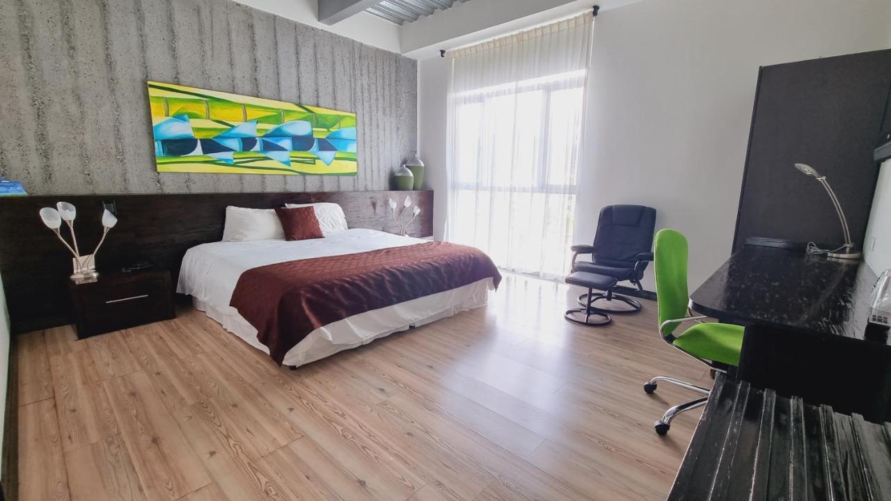 Habitat Suites Hotel Перейра Экстерьер фото