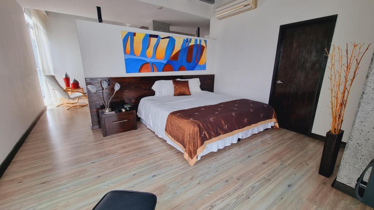 Habitat Suites Hotel Перейра Экстерьер фото