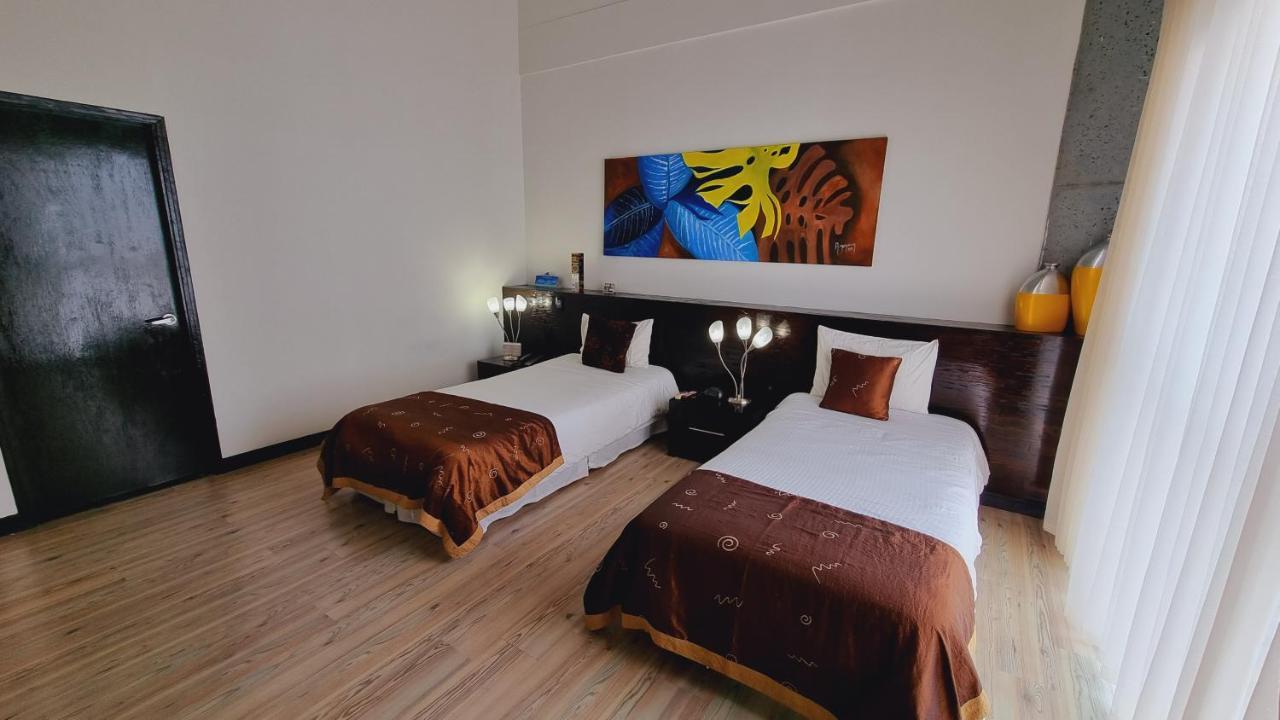 Habitat Suites Hotel Перейра Экстерьер фото